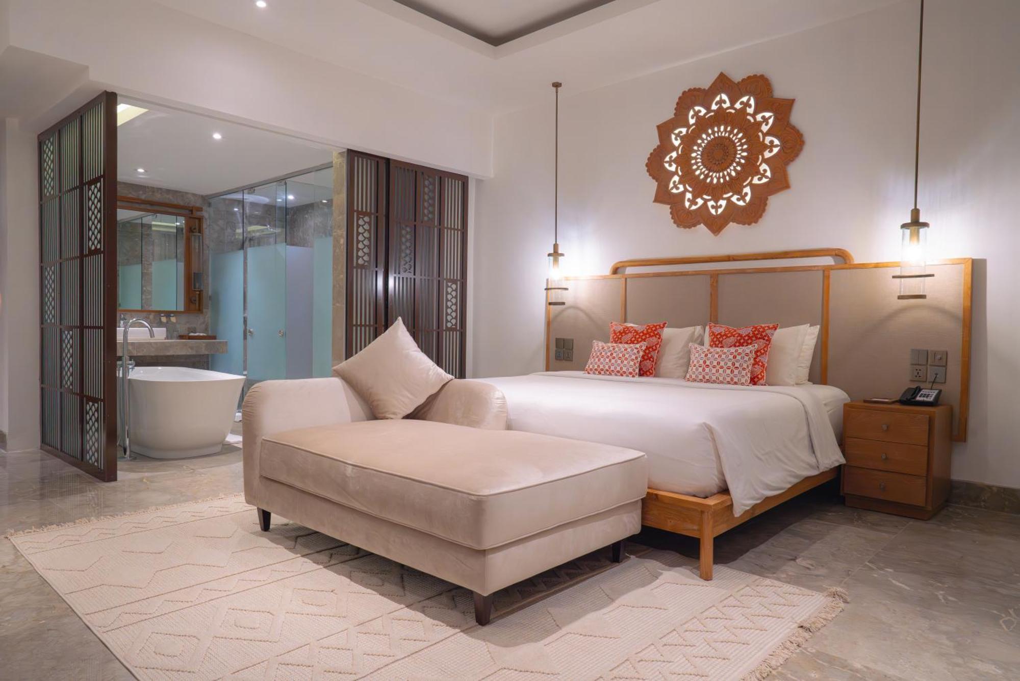 منتجع غويا البوتيكي أوبود المظهر الخارجي الصورة A bedroom at the hotel